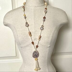 long beaded pendant necklace